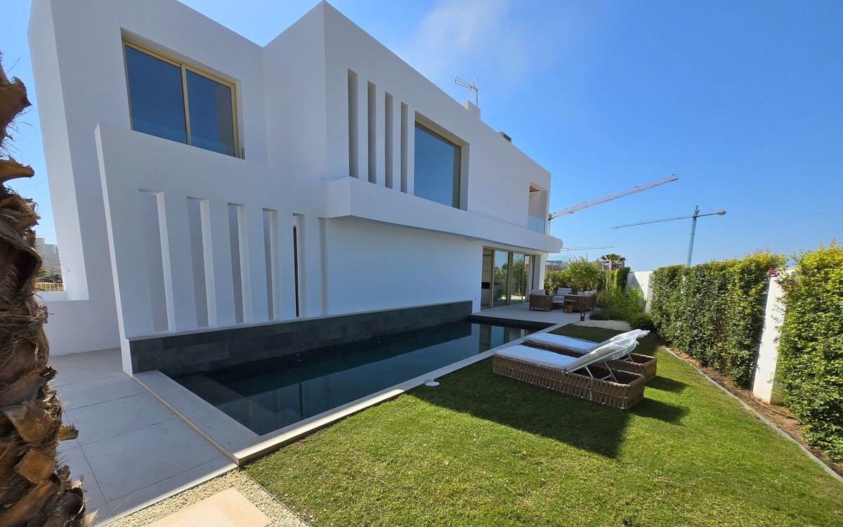 Modern Villa Higueron exterior with private lap pool, panoramic sea and mountain views, El Higueron, Costa del Sol